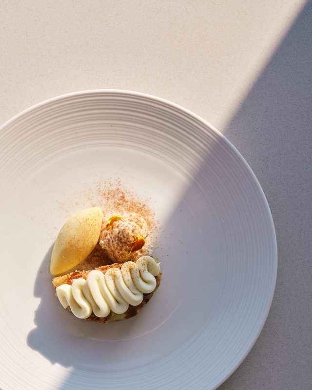 The olive-oil almond pie with rice-pudding foam, cinnamon crémeux and orange sorbet with tahini